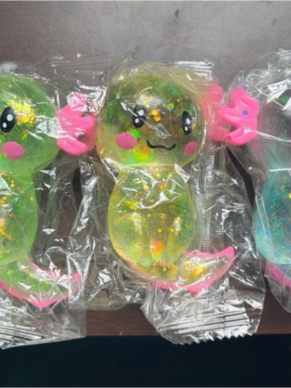 Unbranded Green Glitter Reptile Squishy Toy with Pink Accents